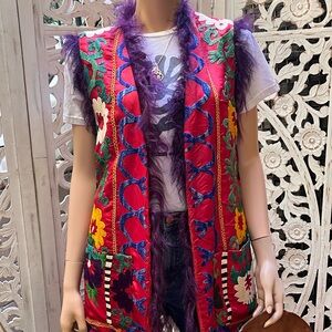 I gave embroidered vest with Mongolian fur trim size M